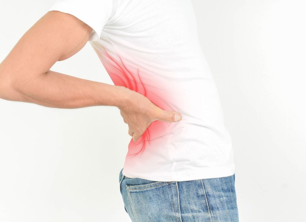 पुरुषों में कमर दर्द के कारण | Causes of Back Pain in Men in Hindi